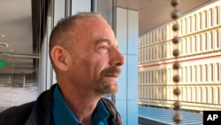 Timothy Ray Brown, shown in Seattle March 4, 2019, is also known as the "Berlin patient," the first person to be cured of HIV infection, more than a decade ago. Now researchers are reporting a second patient has lived 18 months after stopping HIV treatmen