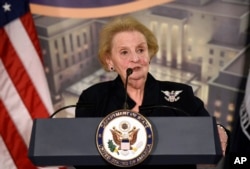 Former Secretary of State Madeleine Albright speaks at a reception celebrating the completion of the U.S. Diplomacy Center Pavilion at the State Department in Washington, Jan. 10, 2017.