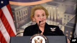 Former Secretary of State Madeleine Albright speaks at a reception celebrating the completion of the U.S. Diplomacy Center Pavilion at the State Department in Washington, Jan. 10, 2017.