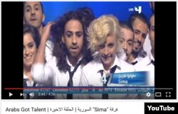 Hassan Rabeh (L) seen in YouTube screenshot from 2013 'Arab's Got Talent' reality talent show broadcast by MBC4 across the Middle East. Rabeh was a member of Sima dance troop,which won first place in the 2013 contest.