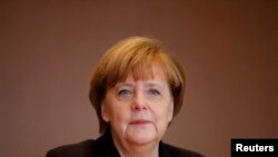 German Chancellor Angela Merkel attends the weekly cabinet meeting at the Chancellery in Berlin, Germany, Dec. 1, 2015. 