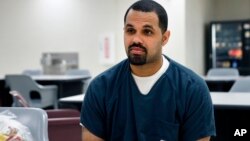 Rene Lima-Marin sits for an interview, May 7, 2014, in a meeting room inside Kit Carson Correctional Center in Burlington, Colorado. Lima-Marin was sent back to prison after being mistakenly released 90 years early.