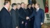 Russian President Putin, right, greets leaders in the outgoing lower house of parlament — Pekhtin is fifth from left — the Kremlin, Moscow, Dec. 11, 2003.