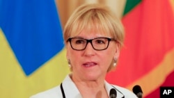 FILE - Swedish foreign minister Margot Wallstrom speaks to reporters.