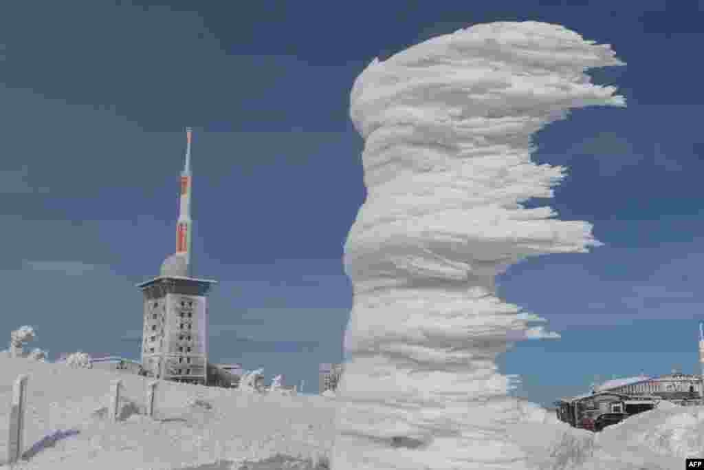 Wind and ice have formed a bizarre sculpture on the snowy Brocken mountain near Schierke in the Harz region, central Germany.
