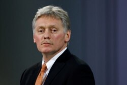 FILE - Kremlin spokesman Dmitry Peskov attends a news conference in Moscow, Russia, Dec. 23, 2021.