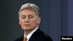 Kremlin spokesman Dmitry Peskov attends a news conference in Moscow, Russia, Dec. 23, 2021.