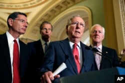 From left, Sen. John Barrasso, R-Wyo., Sen. John Thune, R-S.D., Senate Majority Leader Mitch McConnell of Ky., and Senate Majority Whip John Cornyn of Texas, participate in a news conference on Capitol Hill in Washington, Nov. 16, 2016.