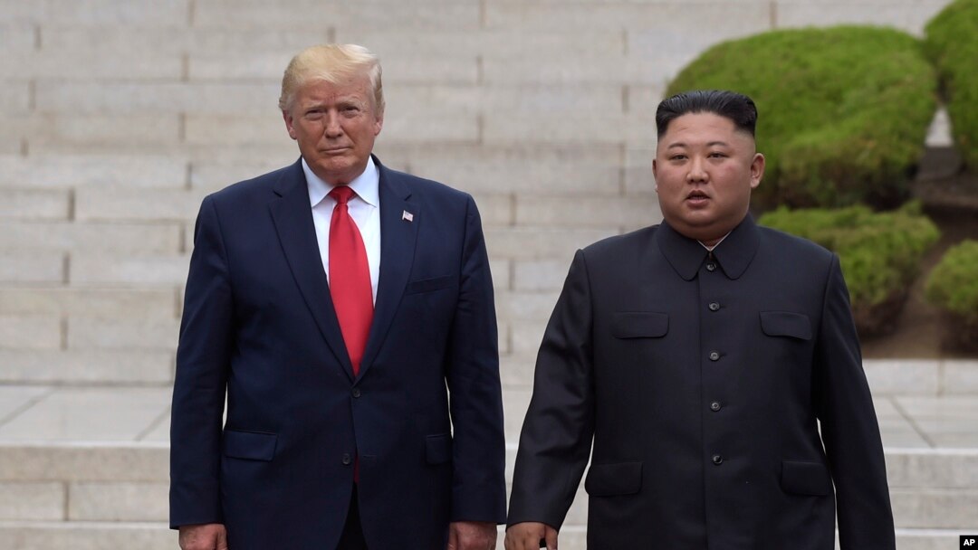 Predsednik SAD Donald Tramp i severnokorejski lider Kim Džong Un