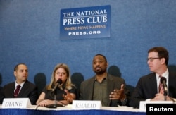 Plaintiffs Diane Gross and Khalid Pitts (2nd R), co-owners of Cork Wine Bar, sit with their lawyers during a news conference at the National Press Club held to announce the filing of a lawsuit against U.S. President Donald Trump and his D.C. hotel company alleging unfair competition in Washington, March 9, 2017.