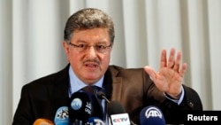 Salim al-Muslat, spokesman for the High Negotiations Committee (HNC), the main Syrian opposition group at the Geneva peace talks, attends a news conference in Geneva, Switzerland, Jan. 31, 2016.