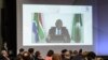 Le président sud-africain Cyril Ramaphosa prononce un discours à distance à l'ouverture du Forum public de l'OMC 2021 avec une table ronde sur Covid et le commerce, le 28 septembre 2021 à Genève. 