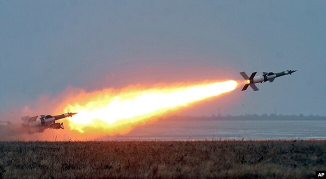 FILE - In this photo released by the Ukrainian National Security and Defense Council, an anti-aircraft rocket system is tested at a military training ground Odessa region, Ukraine, Dec. 5, 2018. The Ukrainian military has been on increased readiness as part of martial law introduced in the country in the wake of the Nov. 25, 2018, incident in the Sea of Azov, in which the Russian coast guard fired upon and seized three Ukrainian navy vessels along with their crews.