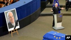 FILE - Former U.S President Bill Clinton delivers his speech during an homage ceremony for former German Chancellor Helmut Kohl, at the European Parliament in Strasbourg, eastern France, Saturday July 1, 2017. (AP Photo/Michel Euler)