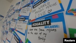 Hand-written messages line at a call center for the 'Yes' campaign in Australia's gay marriage vote, as Australia's high court allows a government plan for a postal vote to legalize same-sex marriage, in Sydney, Australia, Sept. 6, 2017.