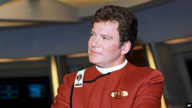 FILE - In this 1988 photo, William Shatner poses as Captain James T. Kirk while promoting the movie
