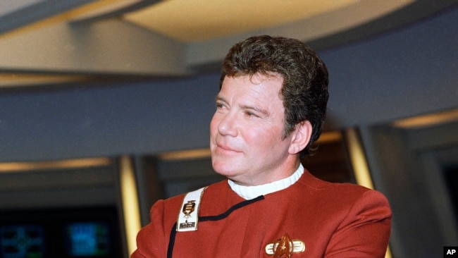 FILE - In this 1988 photo, William Shatner poses as Captain James T. Kirk while promoting the movie