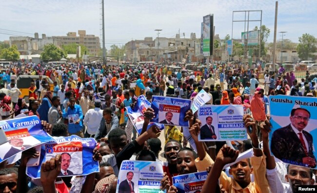 Civilians celebrate the election of President Mohamed Abdullahi Mohamed in the streets of Somalia's capital Mogadishu, Feb. 9, 2017.