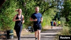 The first female journalist to receive the Kim Wall Scholarship Anne Kirstine Hermann participates in the "Run for Kim," in Copenhagen, Denmark, Aug. 10, 2018. In memory of the murdered Swedish journalist Kim Wall there are memorial runs in Paris, Beijing, London, Berlin and her Swedish home town Trelleborg. 