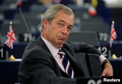 Nigel Farage waits for the start of a debate on the last European Summit at the European Parliament in Strasbourg, France, Oct. 26, 2016.