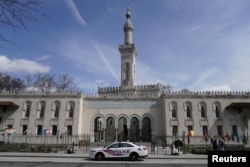 A Metropolitan Police vehicle sits outside the Islamic Center of Washington in Washington, D.C., following the mosque attacks in New Zealand, March 15, 2019.