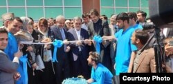The ribbon-cutting is shown for the Muhammad Ali Jinnah Hospital in Kabul, one of three major health care facilities being built and funded by Islamabad as its contribution to reconstruction efforts in war-ravaged Afghanistan.