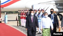 Myanmar Foreign Minister Wunna Maung Lwin welcomes Cambodian Prime Minister Hun Sen in Naypyitaw, Myanmar, Jan. 7, 2022. 