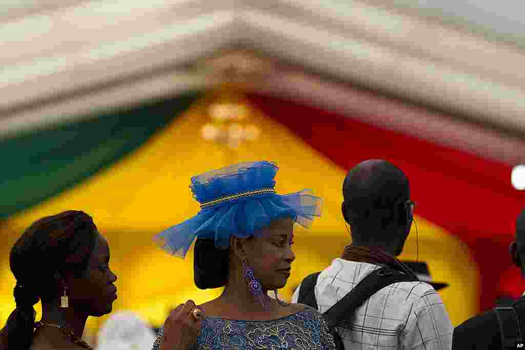 Guests arrive to attend the inauguration of President-elect Macky Sall, at a hotel in Dakar. (AP)
