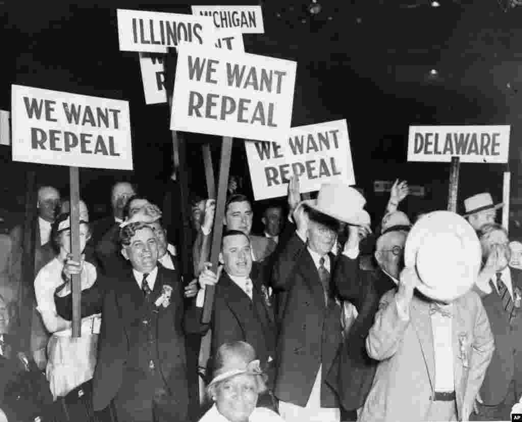 FILE - Carrying placards urging repeal of the 20-year provision for payout, Bonus Army vets unleash their first major demonstration at the Republican National Convention in Chicago, Ill., June 15, 1932. Herbert Hoover and Charles Curtis were nominated as presidential and vice presidential candidates, respectively.