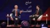U.S. special representative for Afghan peace and reconciliation Zalmay Khalilzad, left, gestures as he speaks during a forum with Afghan director of TOLO news Lotfullah Najafizada at the Tolo TV station in Kabul, April 28, 2019.