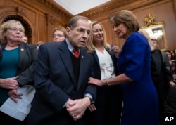 FILE - Speaker of the House Nancy Pelosi, D-Calif., right, speaks with Rep. Jerrold Nadler, D-N.Y., center, chairman of the House Judiciary Committee, at the Capitol in Washington.