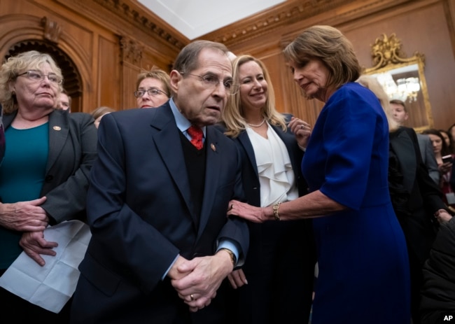 FILE - Speaker of the House Nancy Pelosi, D-Calif., right, speaks with Rep. Jerrold Nadler, D-N.Y., center, chairman of the House Judiciary Committee, at the Capitol in Washington.