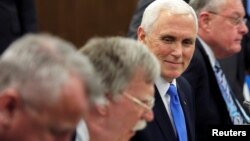 U.S. Vice President Mike Pence attends a bilateral meeting with Indonesia's President Joko Widodo (not pictured) in Singapore, Nov. 14, 2018. 