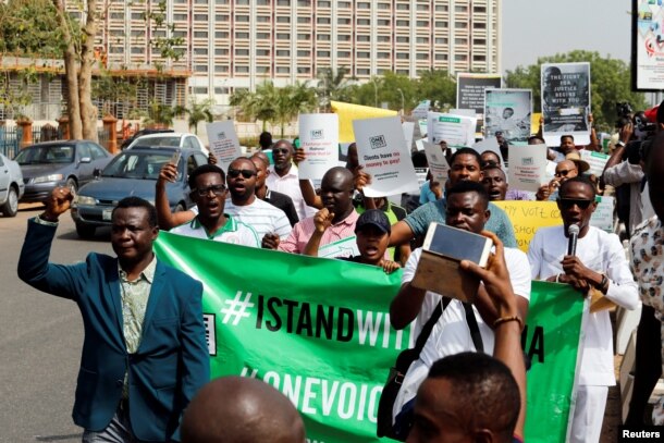 Demonstrators marching in Lagos Monday.