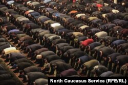 Worshipers pray together in the Chechen capitol of Grozny. The republic is predominately Sunni Muslim.