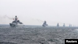 Chinese Navy warships take part in an international fleet review, April 23, 2009.