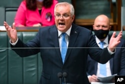 Australian Prime Minister Scott Morrison speaks at the Houses of Parliament in Canberra, Tuesday, October 19, 2021. (Photo: AP)