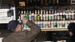 A Russian man drinking near a liquor seller in Moscow last year