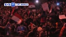 Protests against President Morsi continue in Cairo ahead of Saturday’s constitutional referendum.