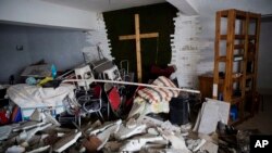 FILE - A demolished house church is seen in the city of Zhengzhou in central China's Henan province, June 3, 2018.