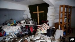 ARHIVA - Uništena crkva u gradu Žengžou u centralnoj kineskoj pokrajini Henan, 3. jun 2018. (Foto: AP/Ng Han Guan)