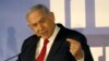 Netanyahu Vows to Stay On in Face of Charges