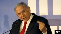 Israeli Prime Minister Benjamin Netanyahu delivers a statement to reporters on Feb. 28, 2019, in Jerusalem. Israel's attorney general announced Thursday that he intended to indict the prime minister on charges of bribery, fraud and breach of trust. 