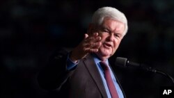 FILE - Former Speaker of the House Newt Gingrich introduces Donald Trump during a campaign rally, Sept. 19, 2016, in Fort Myers, Fla.