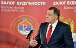 FILE - Serb representative in Bosnia and Herzegovina's tripartite presidency Milorad Dodik addresses journalists after meeting with Russian Foreign Minister Sergey Lavrov (not pictured) in East-Sarajevo, Dec. 14, 2020.