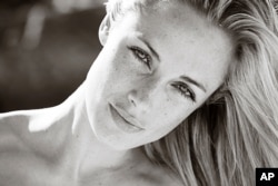 FILE - An undated portfolio photo supplied by Ice Model Management in Johannesburg of Oscar Pistorius' late girlfriend, Reeva Steenkamp, during a photo shoot.