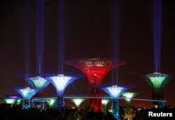 Supertree structures transform into "lightsabers" during activities to mark "May the 4th" Star Wars Day at Gardens by the Bay in Singapore May 4, 2017.