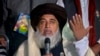 FILE - Khadim Hussain Rizvi, founder of Tehreek-e-Labbaik Pakistan, gestures during a news conference in Islamabad, Pakistan, Nov. 26, 2017.