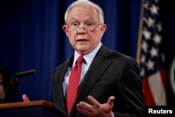 FILE - U.S. Attorney General Jeff Sessions speaks during a news conference at the Department of Justice in Washington, Dec. 15, 2017.