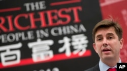 British Rupert Hoogewerf, seen in this file photo, says mainland China has more billionaires than the United States, which has a total of 535. He publishes 'The Hurun Report' which includes an annual list of the richest people in China.